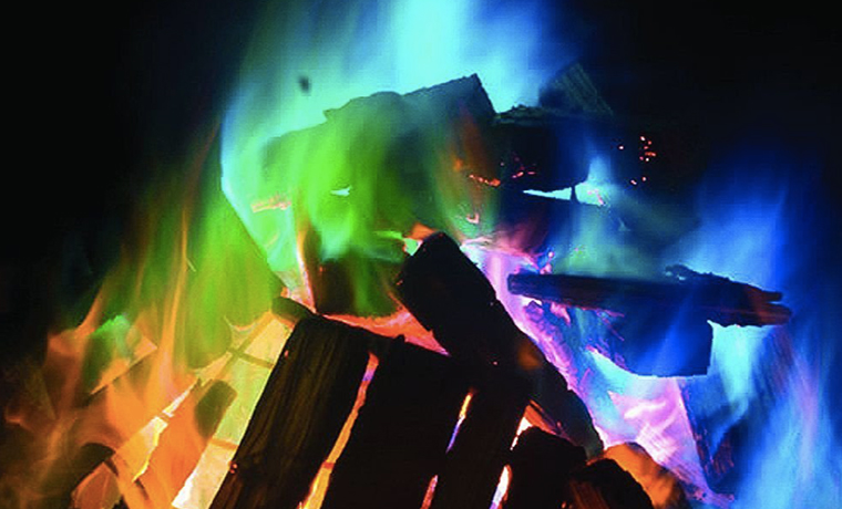 A campfire with multicolored flames