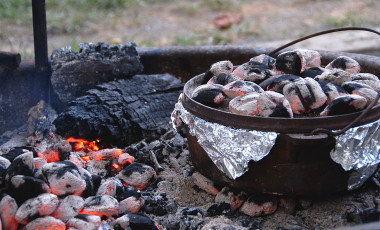 Hot coals on a Dutch oven