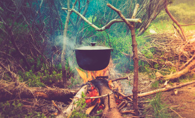 Camp cooking over campfire