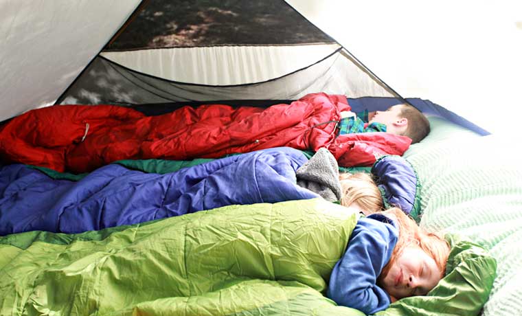 Campers sleeping in a tent