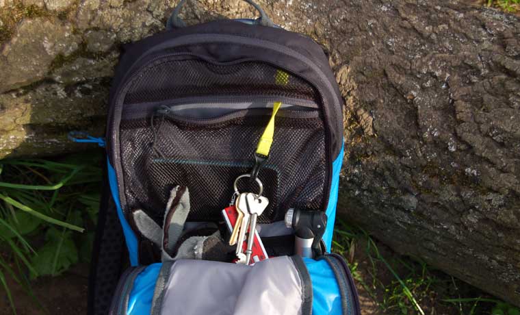 Key attachment in backpack pocket