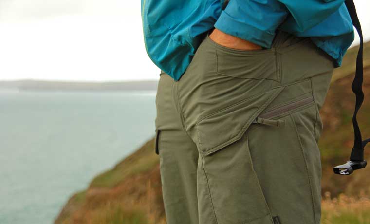 Hiking pants with hands in pocket
