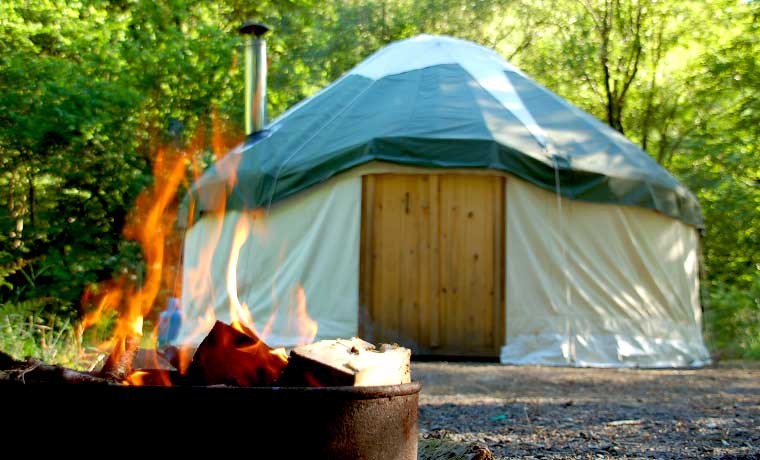 Campfire and yurt