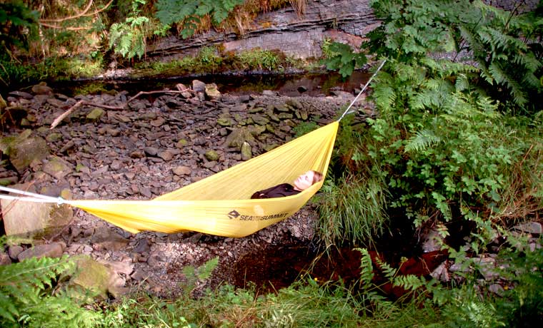 Woman sleeping in hammock