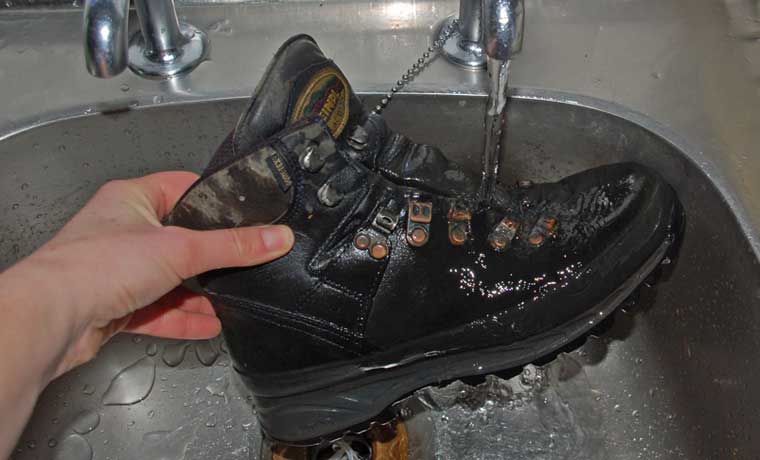 Rinsing boots in sink