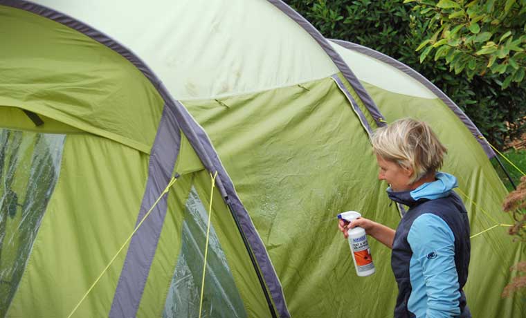 Applying tent waterproof spray