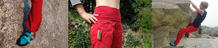 Climbing in red Ocun pants