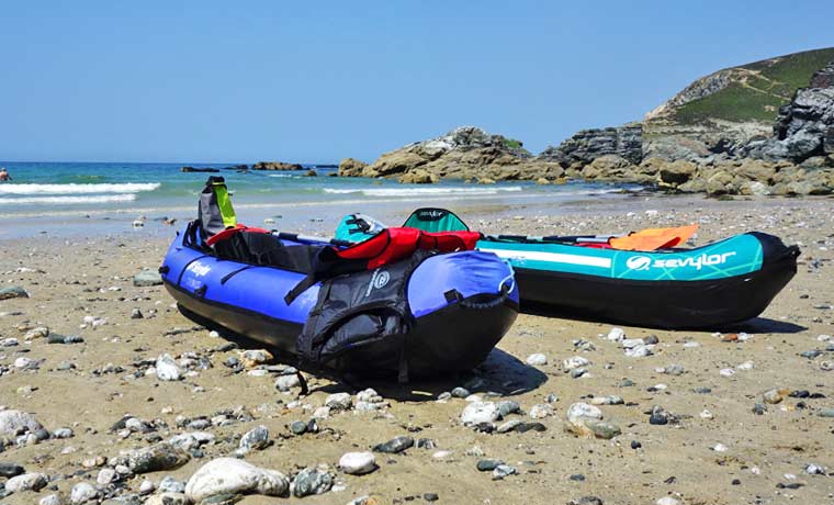 inflatable kayaks on beach