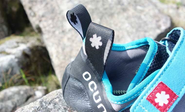 Pull tabs on climbing shoe