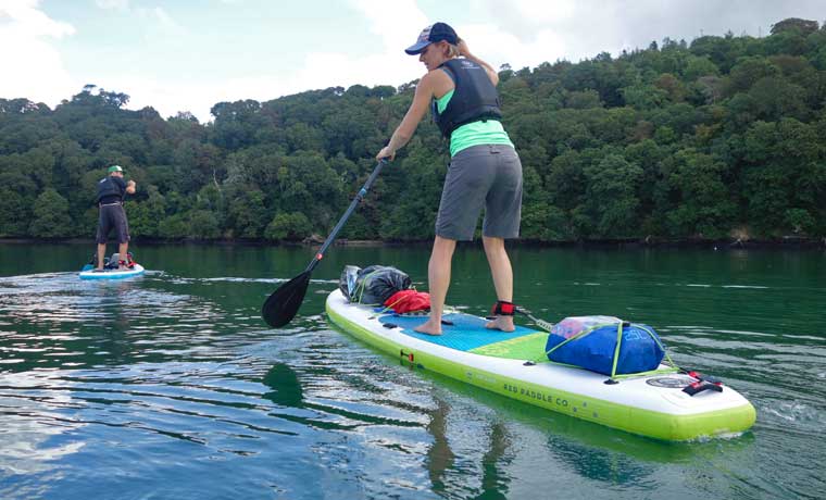 Woman on stand up paddle board
