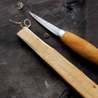 Whittling knife and wood