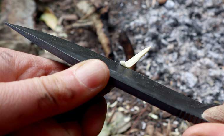 Whittling with a knife