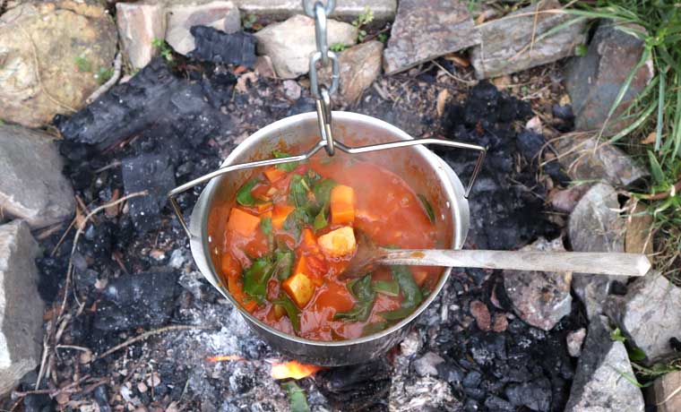 Curry over a campfire