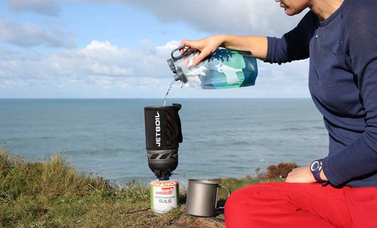 Pouring water into Jetboil