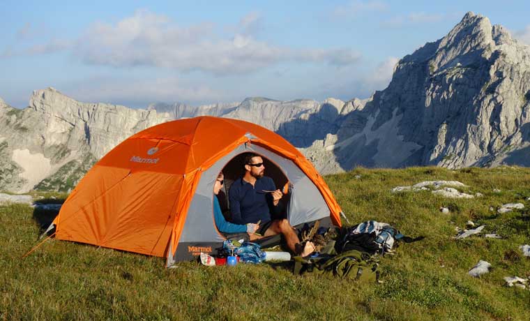 Couple camping in the mountains