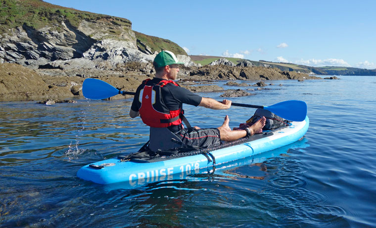Sup kayak hybrid on the water