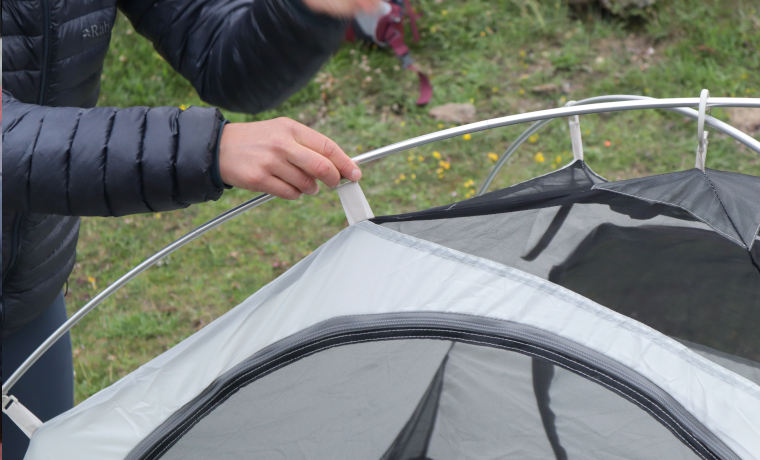 Tent pole attachments