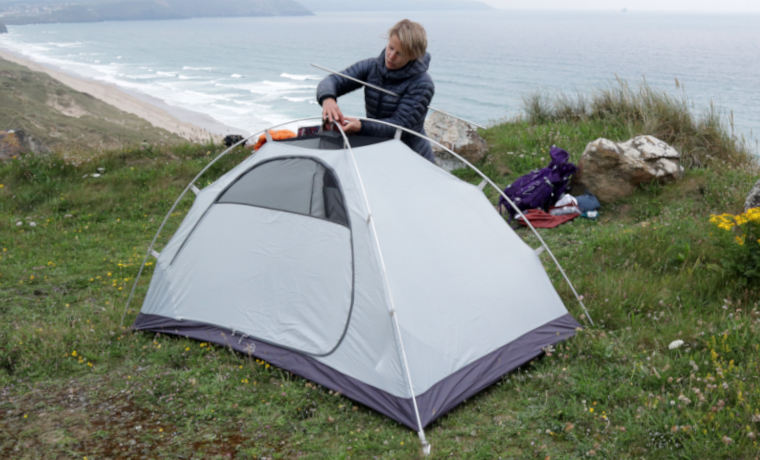 Woman putting up Inner tent