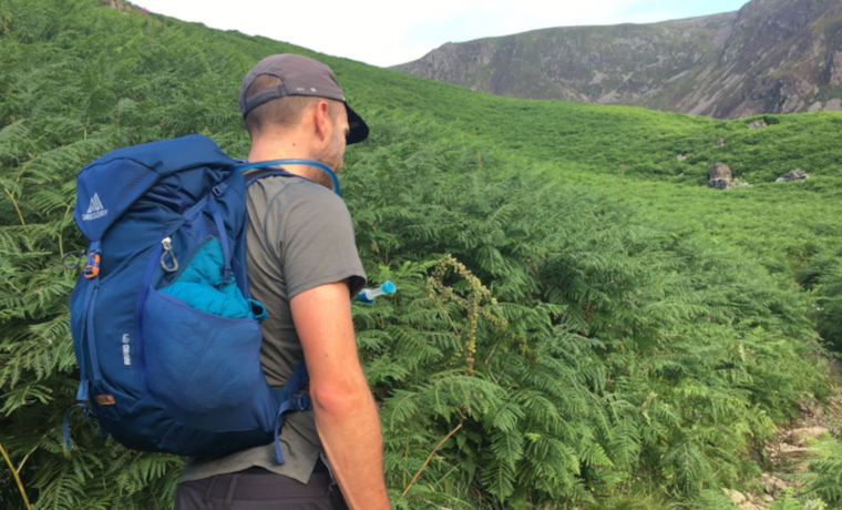 Man hiking with day pack