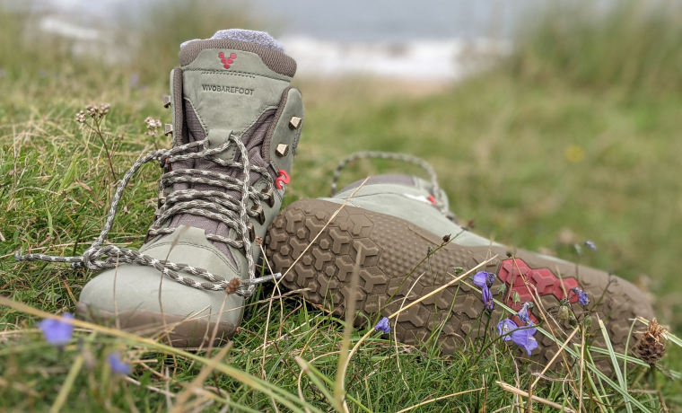 Vivobarefoot Tracker Boots in the grass