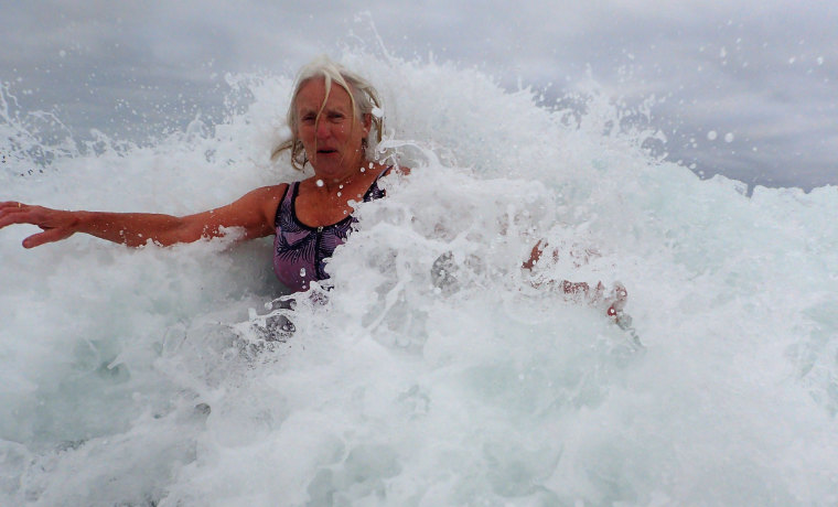 Woman splashing in the sea