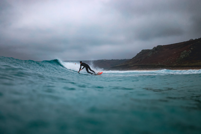Surfer at Sennen in Cornwall