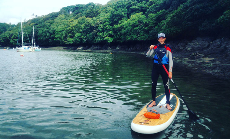 Man on stand up paddle board