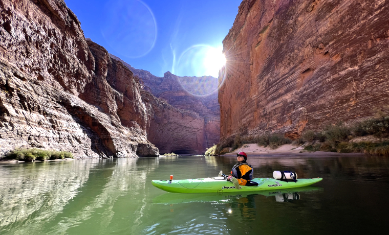 Woman kayaking in the grand canyon