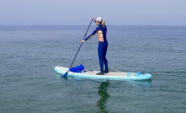 Woman on Aquaplanet Paddle Board