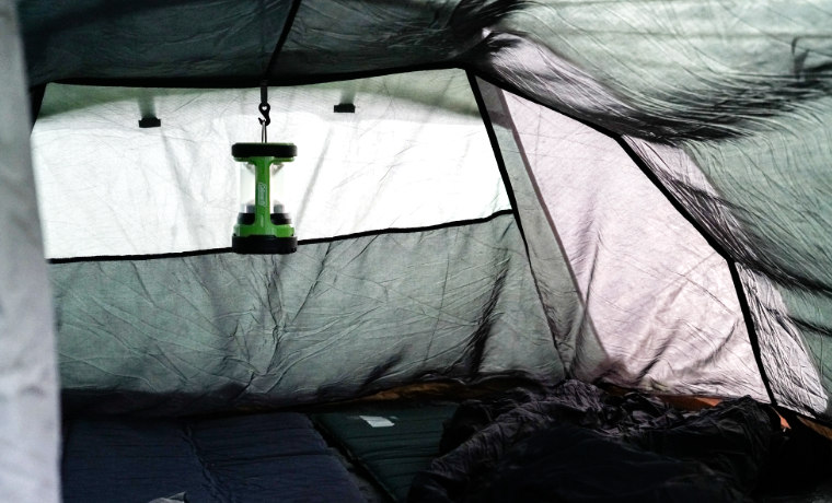 Lantern hanging inside tent