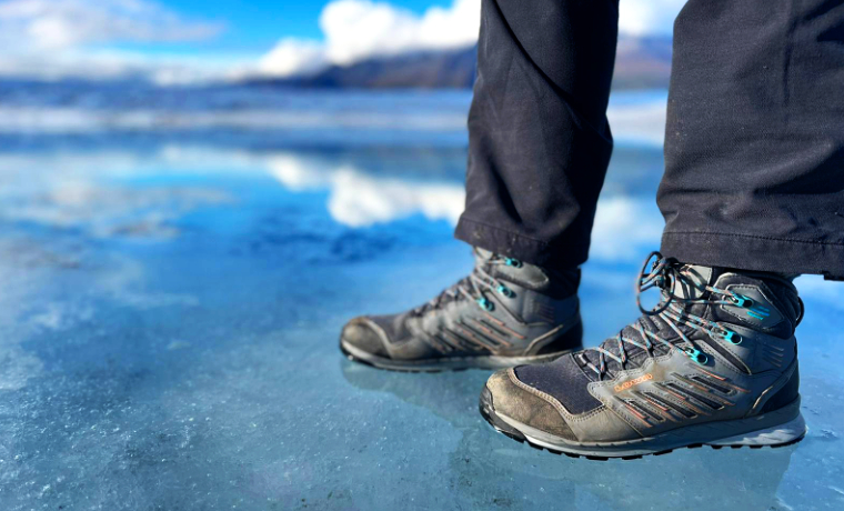 Lowa Trek Evo Mid GTX hiking boots standing on ice