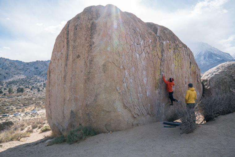 People bouldering outdoors