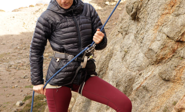 Woman demonstrating how to belay