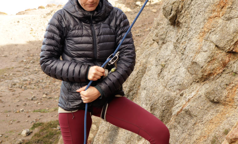 Woman demonstrating how to belay