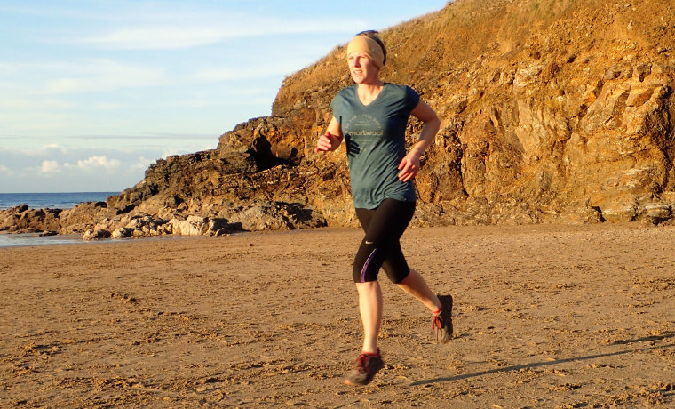 Woman running on the beach