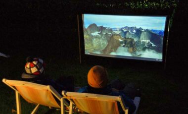 Watching the best climbing documentaries on outdoor projector