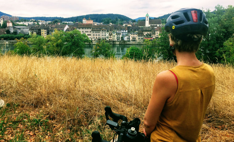 Cyclist looking over the Rhine river