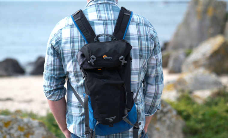 Man carrying camera backpack