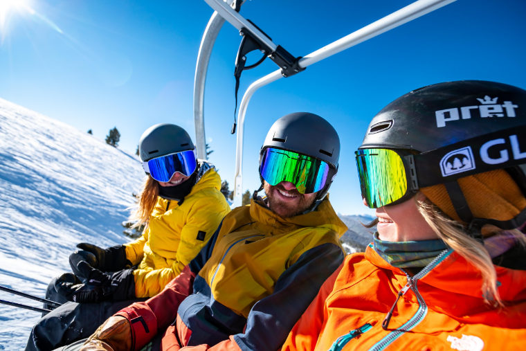 People chatting on ski lift