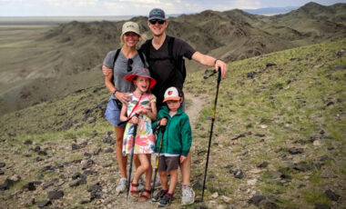 Family hiking on trail
